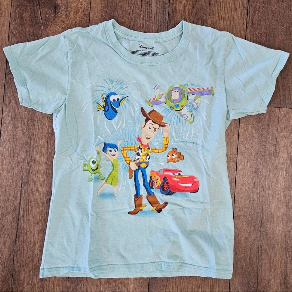 Light blue Disney Pixar 30th anniversary tshirt. Size kids L